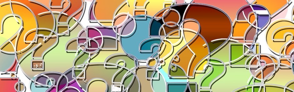 An image of colourful question marks