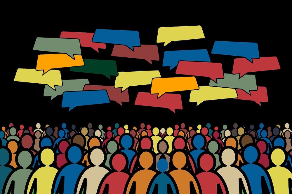 An image depicting colourful individuals with vibrant comment boxes above them.