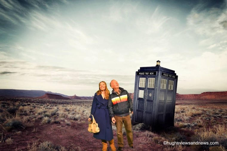 A photo of a man and woman who have just stepped out of Doctor Who's TARDIS onto a strange planet.