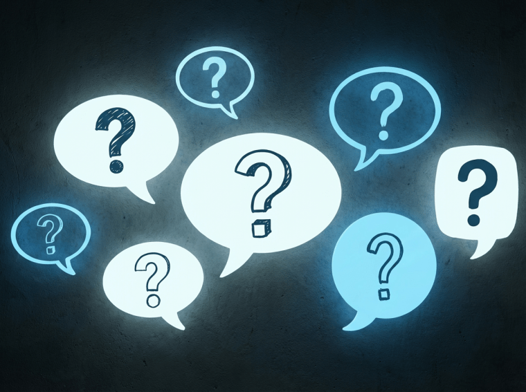 Multiple glowing speech bubbles containing question marks against a dark background.
