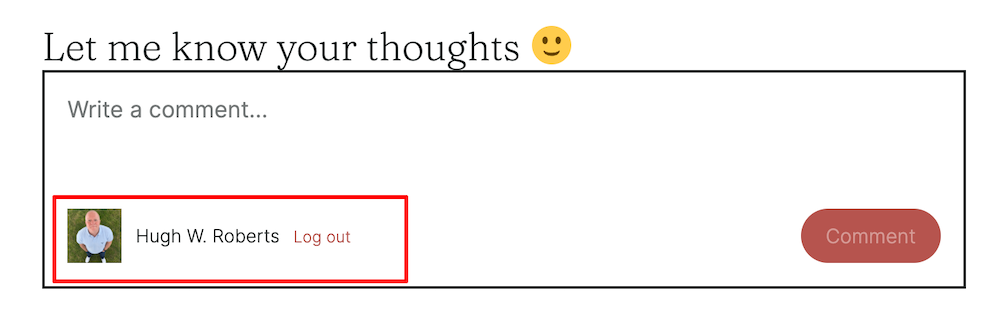 A screenshot of a working blog comment box under the heading "Let me know your thoughts" followed by a yellow smiley face emoji. Inside the framed input box, gray placeholder text reads "Write a comment..." At the bottom left, highlighted by a red outline box, is a profile avatar photo next to the name "Hugh W. Roberts" and a red "Log out" link. A rounded, reddish-brown "Comment" button is positioned in the lower right corner